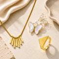 Bar Fringe Necklace, Pearl Butterfly Brooch & Textured Ring Trio